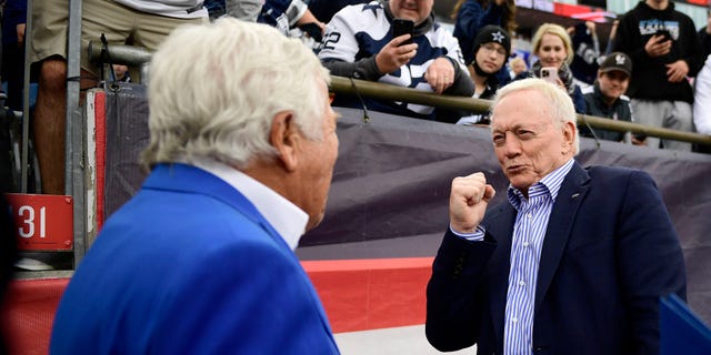 Dallas Cowboys owner Jerry Jones and New England Patriots owner Robert Kraft talk before their game at Gillette Stadium on October 17, 2021 in Foxborough, Massachusetts.