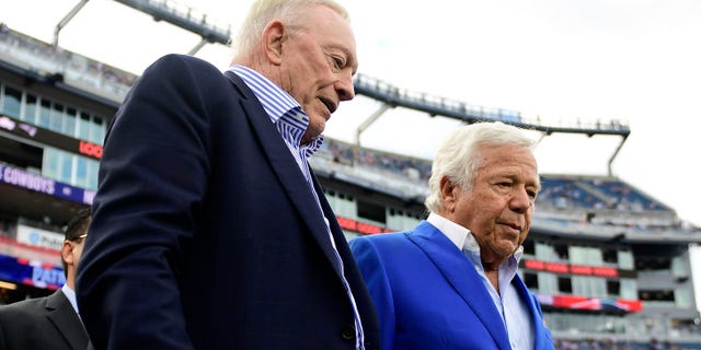 Dallas Cowboys owner Jerry Jones and New England Patriots owner Robert Kraft talk before their game at Gillette Stadium on October 17, 2021 in Foxborough, Massachusetts.