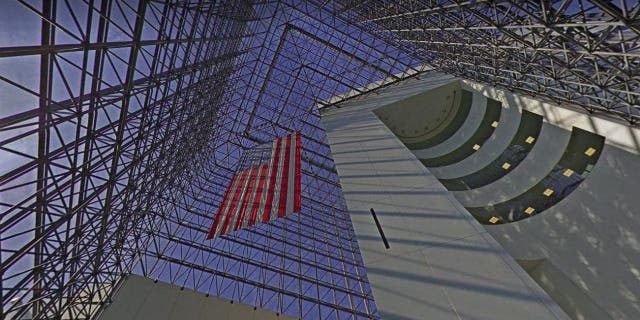 A photo of the inside of the John F. Kennedy Library and Museum shows the 115-foot-high glass pavilion overlooking Dorchester Bay.