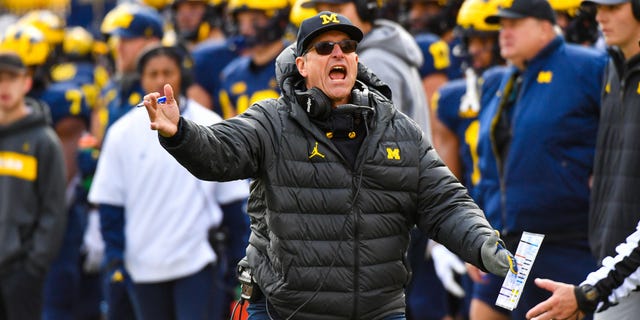 Head Football Coach Jim Harbaugh of the Michigan Wolverines reacts during the second half of a college football game against the Penn State Nittany Lions at Michigan Stadium on October 15, 2022 in Ann Arbor, Michigan. The Michigan Wolverines won the game 41-17 over the Penn State Nittany Lions.