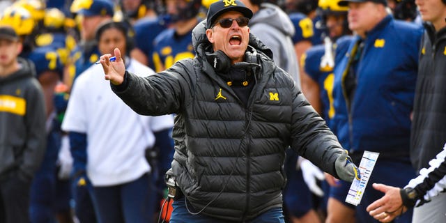 Head Football Coach Jim Harbaugh of the Michigan Wolverines reacts during the second half of a college football game against the Penn State Nittany Lions at Michigan Stadium on October 15, 2022 in Ann Arbor, Michigan. The Michigan Wolverines won the game 41-17 over the Penn State Nittany Lions.