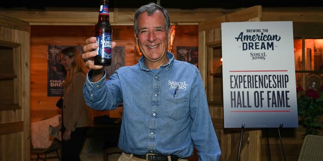 Boston Beer Co. founder Jim Koch raises a beer at the Samuel Adams Crafting Dreams Beer Bash in New York City on Sept. 7, 2022.