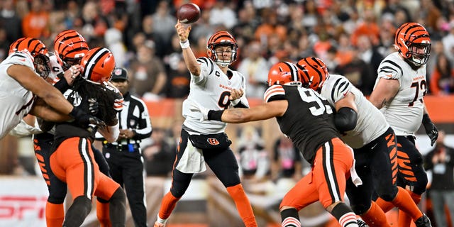 Joe Burrow (9) of the Cincinnati Bengals throws a pass in the first half against the Cleveland Browns at FirstEnergy Stadium Oct. 31, 2022, in Cleveland.