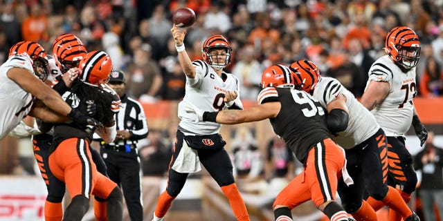 Joe Burrow (9) of the Cincinnati Bengals throws a pass in the first half against the Cleveland Browns at FirstEnergy Stadium Oct. 31, 2022, in Cleveland.