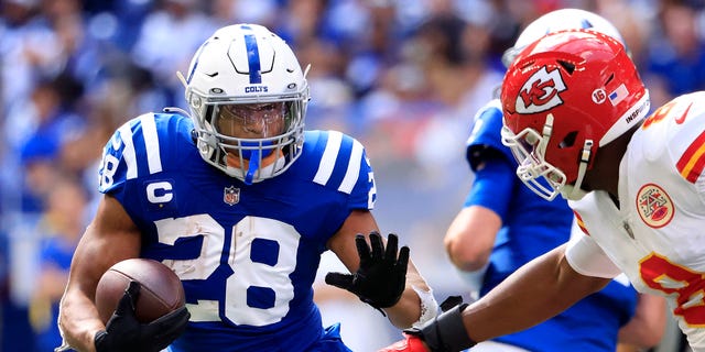 Jonathan Taylor (28) of the Indianapolis Colts runs with the ball against the Kansas City Chiefs at Lucas Oil Stadium on Sept. 25, 2022, in Indianapolis.
