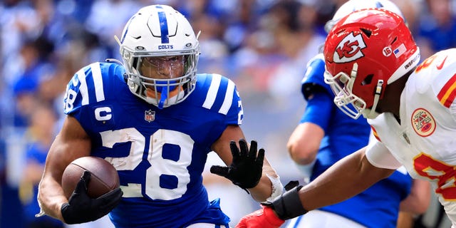 Jonathan Taylor (28) of the Indianapolis Colts runs with the ball against the Kansas City Chiefs at Lucas Oil Stadium on Sept. 25, 2022, in Indianapolis.