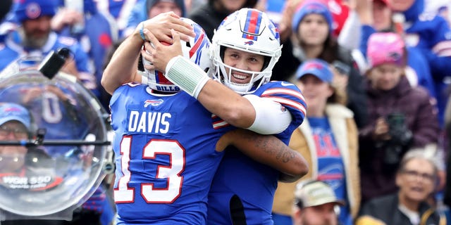 Josh Allen, right, of the Buffalo Bills celebrates with Gabe Davis (13) after a touchdown against the Pittsburgh Steelers during the second quarter at Highmark Stadium Oct. 9, 2022, in Orchard Park, N.Y.