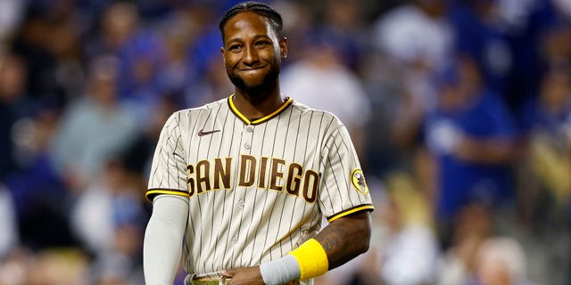 Jurickson Profer #10 of the San Diego Padres after striking out in the third inning during Game 1 of the National League Division Series against the Los Angeles Dodgers on October 11, 2022 at Dodger Stadium in Los Angeles, Calif. , reacted.