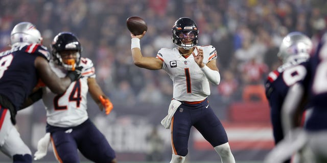 Justin Fields #1 of the Chicago Bears throws a pass during the second half against the New England Patriots at Gillette Stadium on October 24, 2022 in Foxborough, Massachusetts.