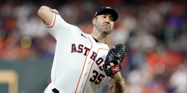 Astros pitcher Justin Verlander throws against the Philadelphia Phillies during the World Series at Minute Maid Park on Oct. 28, 2022, in Houston.
