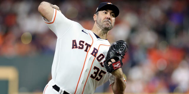 Astros pitcher Justin Verlander throws against the Philadelphia Phillies during the World Series at Minute Maid Park on Oct. 28, 2022, in Houston.