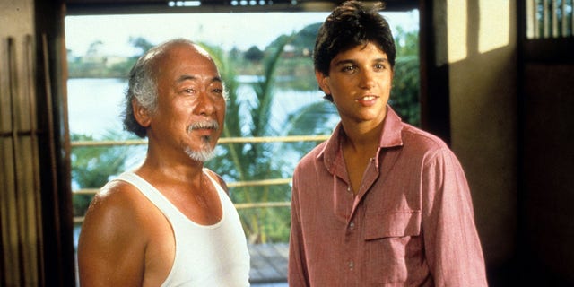 Pat Morita and Ralph Macchio in a scene from the film 'The Karate Kid', 1984. 