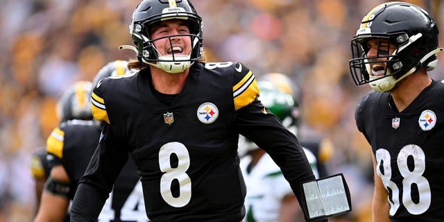 Kenny Pickett of the Pittsburgh Steelers celebrates after scoring a touchdown during the third quarter against the New York Jets at Acrisure Stadium on Oct. 2, 2022, in Pittsburgh.