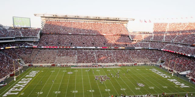 Fans watch the first half between the Texas A and M Aggies and the Ball State Cardinals at Kyle Field Sept. 12, 2015, in College Station, Texas.  