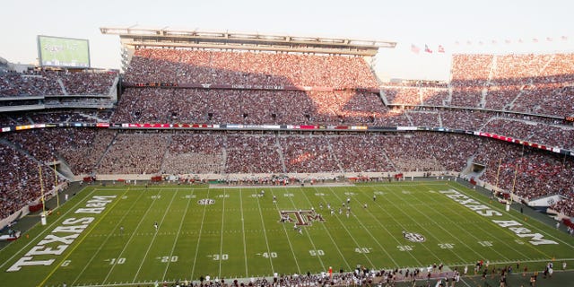 Fans watch the first half between the Texas A and M Aggies and the Ball State Cardinals at Kyle Field Sept. 12, 2015, in College Station, Texas.
