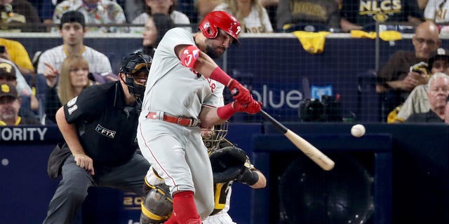 Kyle Schwarber #12 of the Philadelphia Phillies hits a home run during the sixth inning against the San Diego Padres in game one of the National League Championship Series at PETCO Park on October 18, 2022 in San Diego, California.