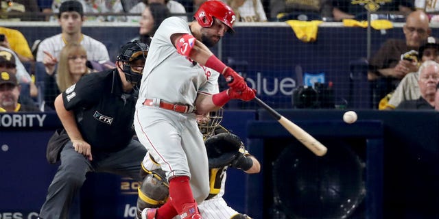 Kyle Schwarber #12 of the Philadelphia Phillies hits a home run during the sixth inning against the San Diego Padres in game one of the National League Championship Series at PETCO Park on October 18, 2022 in San Diego, California.