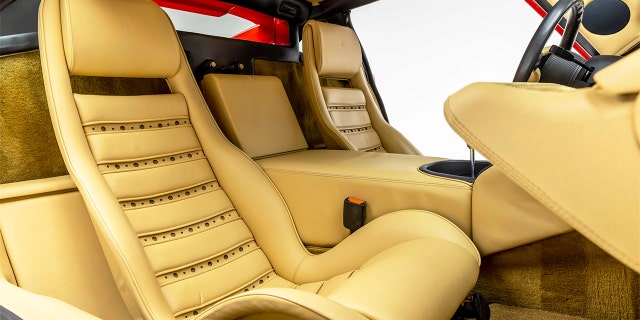 Its tan leather interior is all-original.
