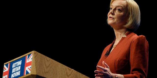 Britain's Prime Minister Liz Truss makes a speech at the Conservative Party conference at the ICC in Birmingham, England, on Wednesday.