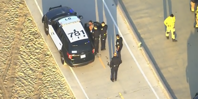 A suspect was taken into custody near the beach at the scene of the third stabbing.