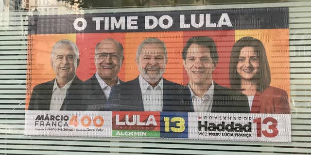 Lula campaign posters in Rio de Janiero, Brazil. Polls give the former president a slight lead ahead of Sunday's runoff election.