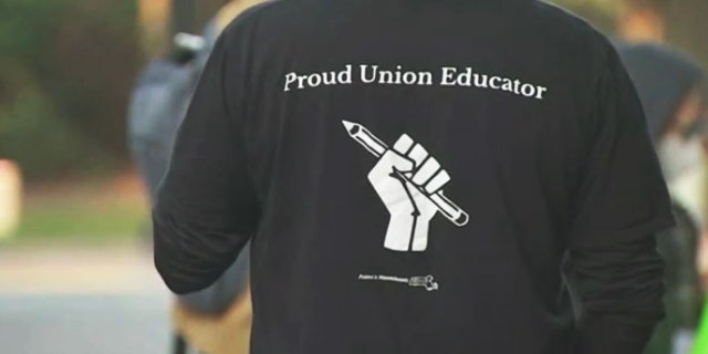 The back of a Massachusetts's educator's T-shirt.