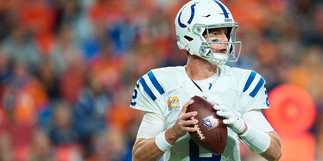 Matt Ryan #2 of the Indianapolis Colts drops back to pass against the Denver Broncos at Empower Field at Mile High on October 6, 2022 in Denver, Colorado.