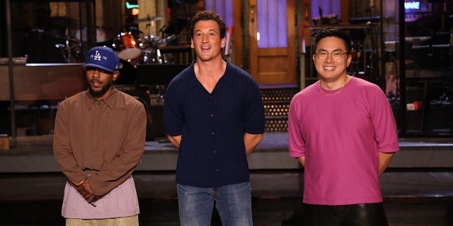 SATURDAY NIGHT LIVE -- Miles Teller, Kendrick Lamar Episode 1827 -- Pictured: (l-r) Musical guest Kendrick Lamar, host Miles Teller, and Bowen Yang during Promos in Studio 8H on Friday, September 30, 2022 -- (Photo by: Will Heath/NBC via Getty Images)