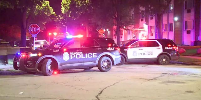 Milwaukee police respond to the scene where Regina "Mya" Allen was fatally shot.