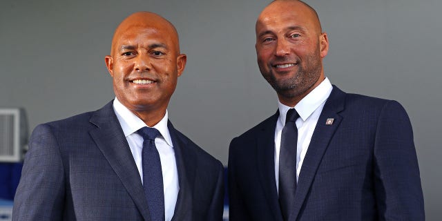 Hall of Famers Mariano Rivera, left, and Derek Jeter are shown during the 2021 Hall of Fame induction ceremony at Clark Sports Center on Sept. 8, 2021, in Cooperstown, New York.