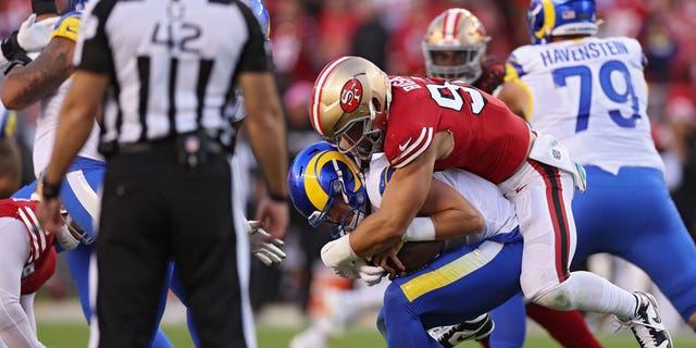 Defensive end Nick Bosa #97 of the San Francisco 49ers sacks quarterback Matthew Stafford #9 of the Los Angeles Rams during the first quarter at Levi's Stadium on October 03, 2022 in Santa Clara, California.