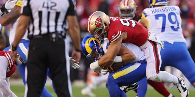 Defensive end Nick Bosa (97) of the San Francisco 49ers sacks quarterback Matthew Stafford (9) of the Los Angeles Rams during the first quarter at Levi's Stadium Oct. 3, 2022, in Santa Clara, Calif.