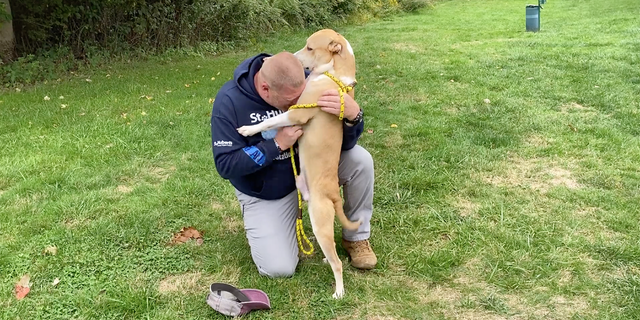 Shelter pup Nolan embraced St. Hubert's Animal Welfare Center transport program coordinator Andrew Hyer upon his arrival in New Jersey.
