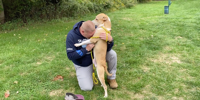 Shelter pup Nolan embraced St. Hubert's Animal Welfare Center transport program coordinator Andrew Hyer upon his arrival in New Jersey.