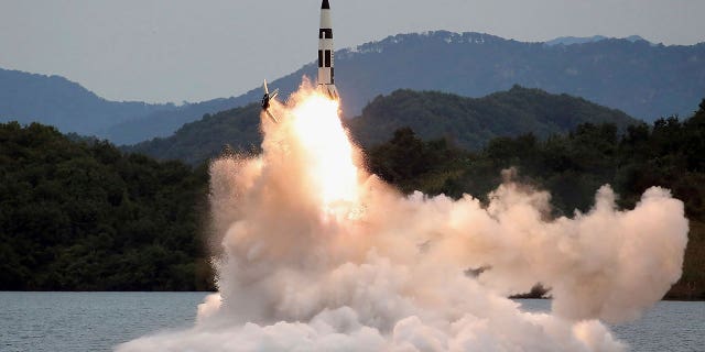 This photo provided on Oct. 10, 2022, by the North Korean government purports to show a missile test at an undisclosed location in North Korea, as taken sometime between Sept. 25 and Oct. 9. Independent journalists were not given access to cover the event depicted in this image distributed by the North Korean government. The content of this image is as provided and cannot be independently verified. Korean language watermark on image as provided by source reads: "KCNA" which is the abbreviation for Korean Central News Agency.