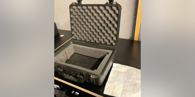 Investigators said the pelican case showed no indications of being exposed to an explosive discharge.