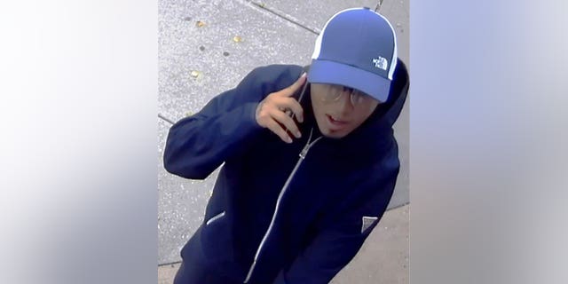 The NYPD released stills of the suspect sought in connection to the daylight robbery of a 66-year-old victim seen dragged across the pavement in Queens. 