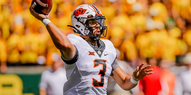 Oklahoma State quarterback Spencer Sanders throws down the field during the first half of a game against Baylor in Waco, Texas, Saturday, Oct. 1, 2022. 