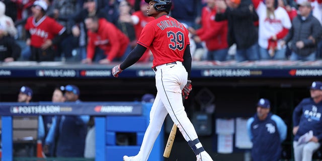 Oscar Gonzalez of the Cleveland Guardians celebrates after hitting a walk-off home run to end the game in the 15th inning against the Tampa Bay Rays in the second game of the wild-card series at Progressive Field on Oct. 8, 2022, in Cleveland.