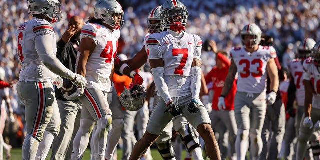 Jordan Hancock #7 of the Ohio State Buckeyes celebrates after a play against the Penn State Nittany Lions during the second half at Beaver Stadium on October 29, 2022 in State College, Pennsylvania.