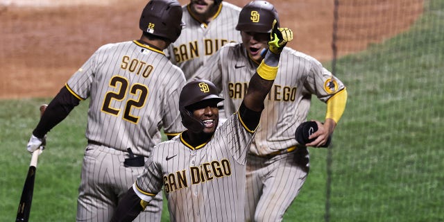 Jurickson Profar #10 of the San Diego Padres points to the crowd after hitting a three-run homer in the fifth inning of Game 1 of the NL Wild Card Series against the New York Mets at Citi Field in Flushing, Oct. 7, 2022. increase. Neighborhood in Queens, New York City.