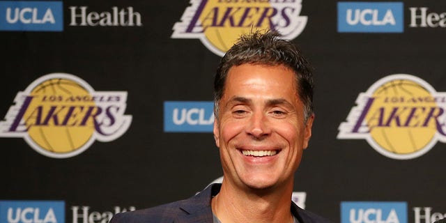 General manager Rob Pelinka, Russell Westbrook #0 and head coach Frank Vogel of the Los Angeles Lakers pose for a picture during a press conference at Staples Center on August 10, 2021 in Los Angeles, California.