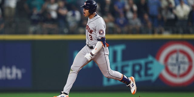 Jeremy Pena #3 of the Houston Astros reacts after hitting a solo home run during the eighteenth inning against the Seattle Mariners in game three of the American League Division Series at T-Mobile Park on October 15, 2022 in Seattle, Washington.