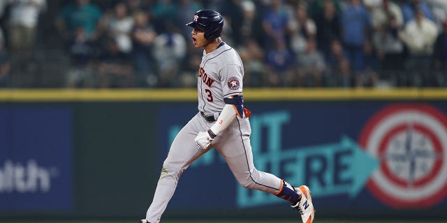Jeremy Pena #3 of the Houston Astros reacts after hitting a solo home run during the eighteenth inning against the Seattle Mariners in game three of the American League Division Series at T-Mobile Park on October 15, 2022 in Seattle, Washington.