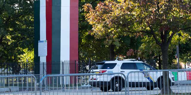 The plywood box that covers a statue of Christopher Columbus in Philadelphia has been painted the colors of the Italian flag, as seen in the photo above taken on Oct. 7, 2022.