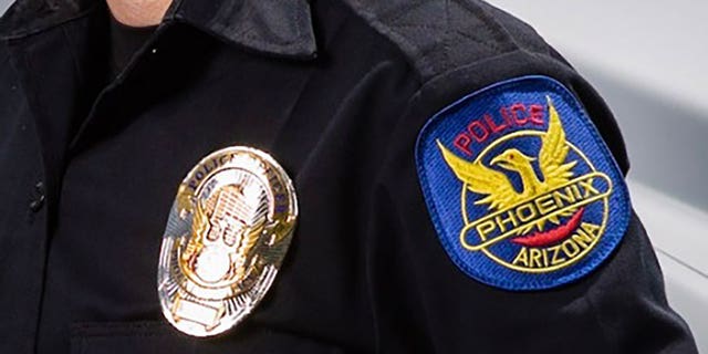 A badge on a Phoenix police officer