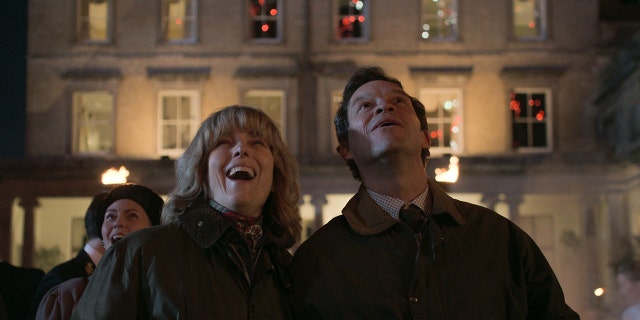 In "The Crown" season 5, another picture features Prince Charles and his then-mistress, Camilla Parker Bowles, sharing a laugh and cozying up outdoors. 