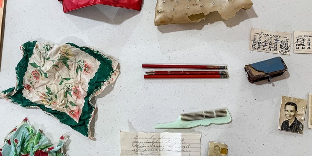 The purse owned by Beverly Williams as a young teenager in Texas contained some colorful handkerchiefs and a red wallet, too.