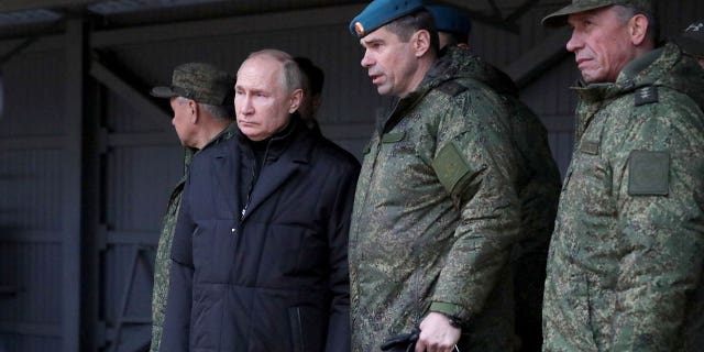 Russian President Vladimir Putin inspects a training ground in the Ryazan region for recruits who were summoned into military service under a partial mobilization, in Ryazan, Russia on Oct. 20, 2022. Putin checked the readiness of those going to the combat zone and issues of forming new units, said a statement.