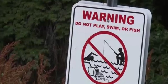 File photo of warning sign at Coldwater Creek in Missouri.